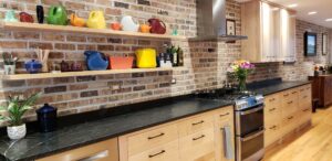 This image is a a view of the sink/stove wall facing towards the dining room