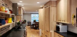 This image shows the Birch kitchen cabinets with the sink/stove wall on the left, and Fridge cabinet on the right. 