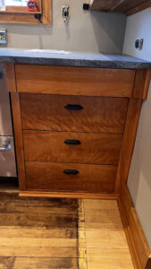 This image shows Next to the Dishdrawers and far right are a bank of 4 drawers with the top drawer 2" out from the lower three drawers. Glen Ellyn Hilltop Gallery