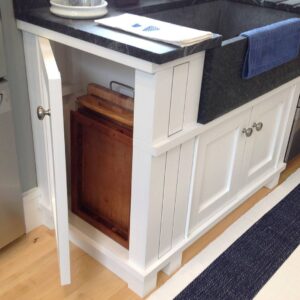 Cookie Sheet, and Tray storage with the door opening on the side of the cabinet instead of the front. A custom detail you won't find anywhere else.