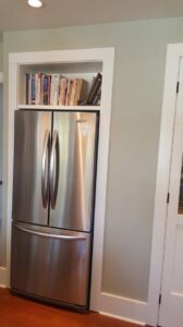 This image shows the Fridge in a polar wood fridge enclosure. The wood is painted white.